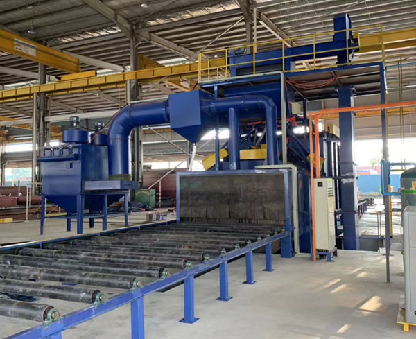 輥道通過式拋丸機(jī) 輥道通過式拋丸機(jī)